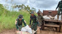 Gotong royong Satgas Yonif 123/Rajawali,Perbaiki jalan rusak di Kimaam, akses vital ke Pelabuhan mulai kembali lancar.