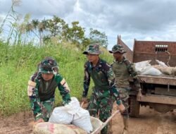 Gotong royong Satgas Yonif 123/Rajawali,Perbaiki jalan rusak di Kimaam, akses vital ke Pelabuhan mulai kembali lancar.